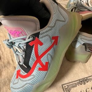 Men's Light Blue and Black Sneakers used with small right side burn mark